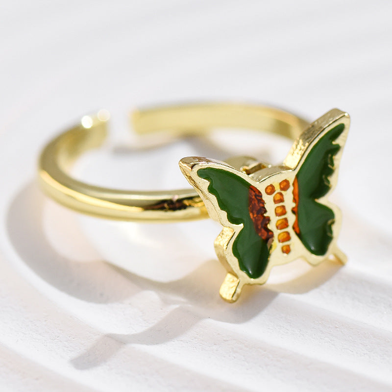 Wholesale Alloy Rotatable Daisy Flower Butterfly Ring